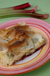 Piece of baked pie with red jam, Rhubarb pie Piece of baked pie with red jam, Rhubarb pie