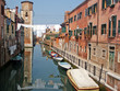 Venice canal near housing home