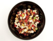 a bowl of mixed fruit and nuts