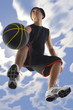 Young basketball player dribbling ball