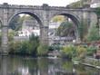 viaduct with reflections over water