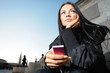 Beautiful young girl listening to portable music player