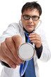 A doctor wearing glasses  in  uniform using a stethocope.