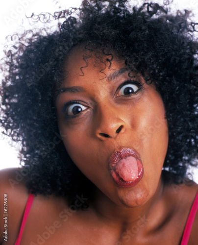 A black woman sticking out her tongue