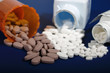 Blood Pressure & Cholesterol meds. Pill in rear heavilly blurred Blood Pressure & Cholesterol meds. Pill in rear heavilly blurred