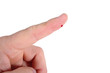 Drop of blood on a finger for a blood glucose test Drop of blood on a finger for a blood glucose test