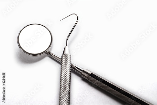 Photo: Isolated set of dentist tooks on white background Isolated set of dentist tooks on white background