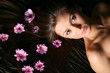 beautiful pink flowers in girl hair beautiful pink flowers in girl hair