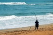 surf fisherman catching fish in Florida