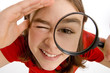 Girl holding magnifying glass Girl holding magnifying glass
