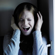 Young woman listening to music