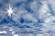 Blue sky with clouds and sun