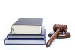 Gavel and law books reflected on white background. Shallow DOF Gavel and law books reflected on white background. Shallow DOF