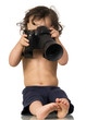 Baby with camera, isolated on a white background.