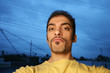 Young man with sceptical look