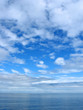 Blue skies over the sea