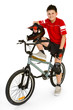 Young, happy biker sitting on BMX