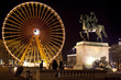 place bellecour à lyon grande roue et statue de louis XIV