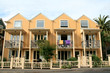 A row of simple wooden holiday homes