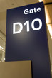 Direction signs in an airport terminal for travelers Direction signs in an airport terminal for travelers
