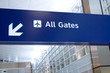 Direction signs in an airport terminal for travelers Direction signs in an airport terminal for travelers
