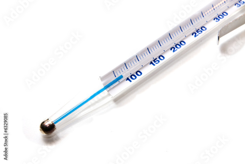 Photo: Thermometer on white background Thermometer on white background