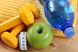dumbbells towel and green apple - ready to fitness