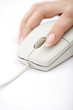 woman holding  a white mouse