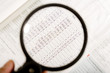 a magnifying glass, financial magazine2