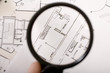 a magnifying glass, a plan