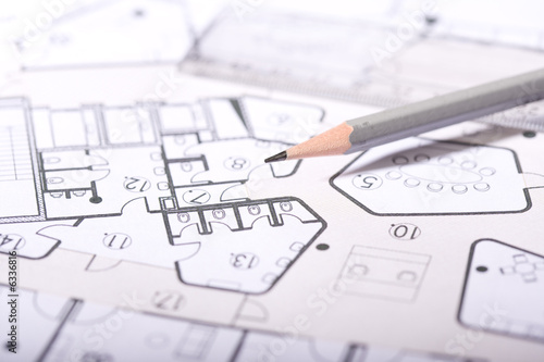Photo: a pencil on an architects plan a pencil on an architects plan