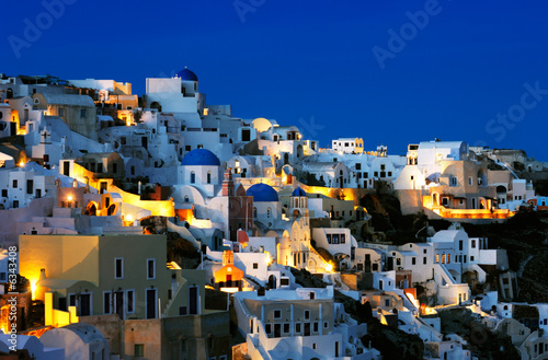 The village of Oia at dusk, on the island of Santorini, Greece