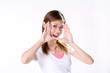 expressive girl with palm out on her face