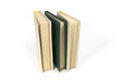 Three hardcover books standing on white background