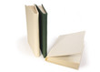 Three hardcover books on white background