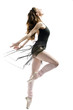 a young wonderful ballerina is dancing gracefully