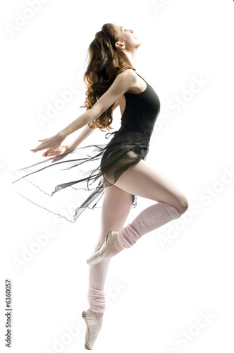 Photo: a young wonderful ballerina is dancing gracefully a young wonderful ballerina is dancing gracefully