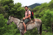 Man horseback riding in Central America