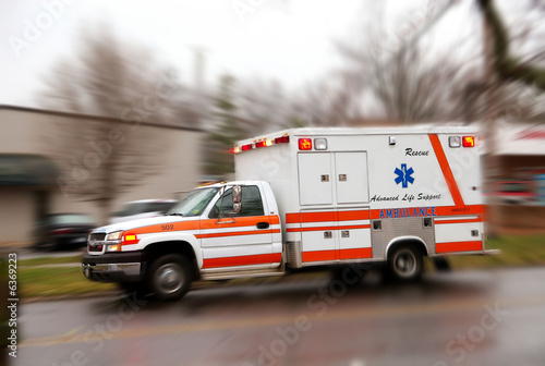 Photo: A moving ambulance on it''s way to a crash site. A moving ambulance on it''s way to a crash site.