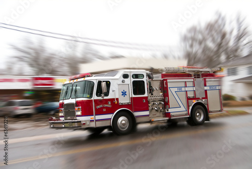 Photo: Fire truck on it''s way to fight a fire. Fire truck on it''s way to fight a fire.