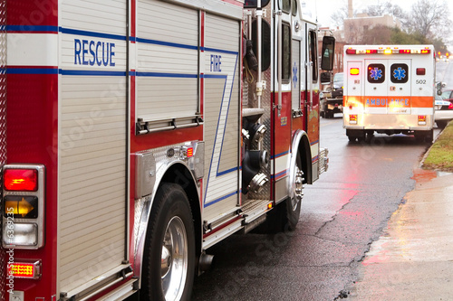 Photo: Fire truck and ambulance on side of road. Fire truck and ambulance on side of road.