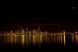 Seattle skyline with the moon almost at full lunar eclipse