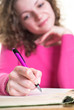 Attractive woman is dreaming about her future.