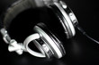 Earphones on black background