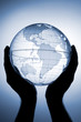 Globe in hands