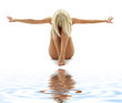 Photo: artistic nudity style picture of woman on white sand artistic nudity style picture of woman on white sand