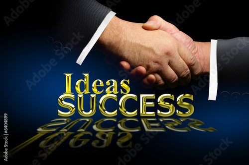 Photo: Hands shaking in agreement with ieas and success Hands shaking in agreement with ieas and success