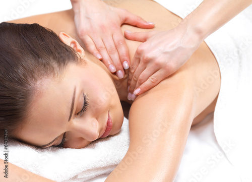 Foto: Beautiful woman getting a massage Beautiful woman getting a massage