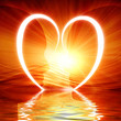 Heart reflected in waves