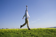 a young man jumping high to success